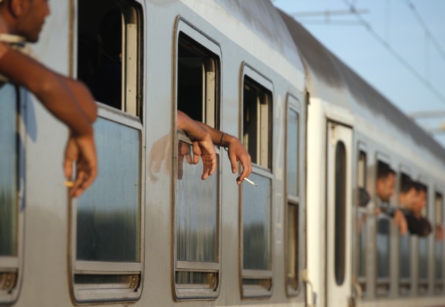  Транспортировка мигрантов. Фото REUTERS/Scanpix