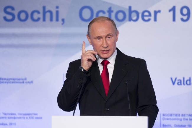 Russian President Vladimir Putin delivers a speech during a session of the Valdai International Discussion Club in Krasnaya Polyana, Sochi, Russia, October 22, 2015. The expansion of the United States' ballistic missile defence system is a threat to Russia's nuclear capability, Putin said on Thursday. REUTERS/Alexander Zemlianichenko/Pool