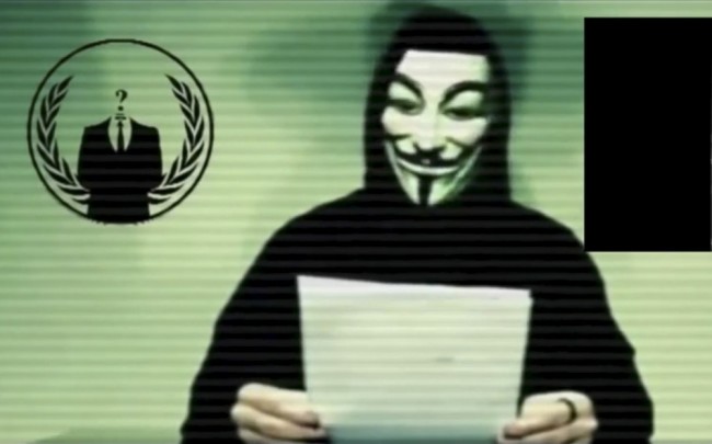 A man wearing a mask associated with Anonymous makes a statement in this still image from a video released on social media on November 16, 2015. Anonymous, the loose-knit network of activist hackers known for cyber attacks on government, corporate and religious websites, is preparing to unleash waves of cyberattacks on Islamic State following the attacks in Paris last week that killed 129 people, self-described members said in a video posted online.  REUTERS/Social Media Website via Reuters TV ATTENTION EDITORS - THIS PICTURE WAS PROVIDED BY A THIRD PARTY. REUTERS IS UNABLE TO INDEPENDENTLY VERIFY THE AUTHENTICITY, CONTENT, LOCATION OR DATE OF THIS IMAGE. FOR EDITORIAL USE ONLY. NOT FOR SALE FOR MARKETING OR ADVERTISING CAMPAIGNS. NO RESALES. NO ARCHIVE. THIS PICTURE WAS PROCESSED BY REUTERS TO ENHANCE QUALITY. AN UNPROCESSED VERSION WILL BE PROVIDED SEPARATELY.