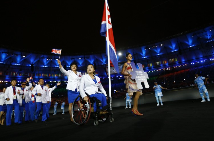 В отличие от, например, спортсменов из КНДР. Фото: Reuters / Scanpix