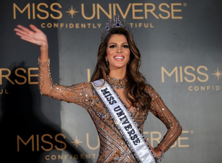 Newly-crowned Miss Universe Iris Mittenaere from France waves during a news conference inside a Mall of Asia arena in metro Manila, Philippines January 30, 2017. REUTERS/Romeo Ranoco