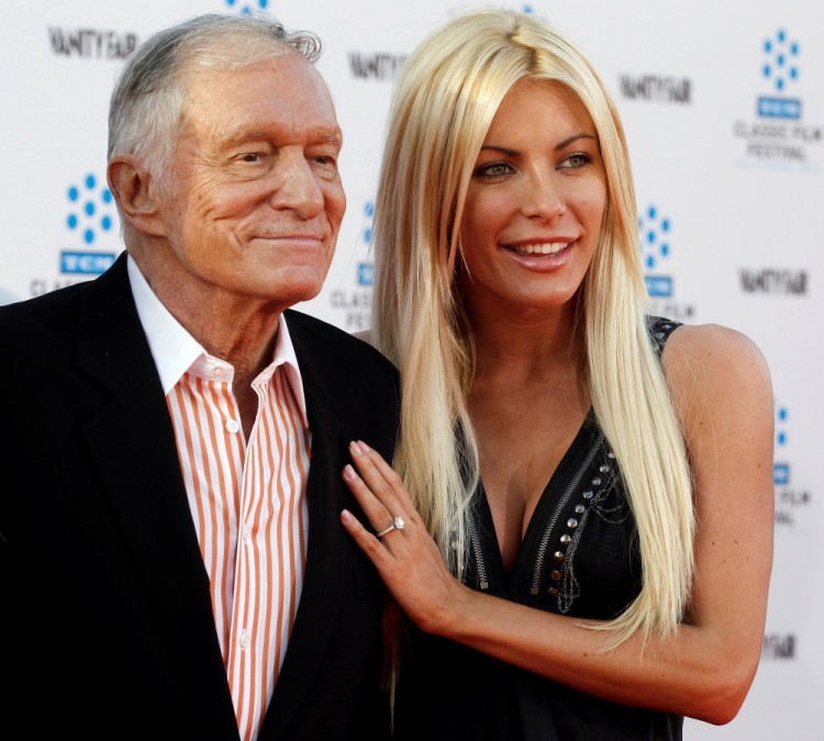 FILE PHOTO -  Hugh Hefner and his fiancee, Playboy Playmate Crystal Harris, arrive at the opening night gala of the 2011 TCM Classic Film Festival featuring a screening of a restoration of 'An American In Paris' in Hollywood, California April 28, 2011.  REUTERS/Fred Prouser/File Photo
