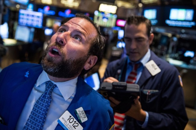 Трейдеры Нью-йоркской фондовой биржи. Фото AFP/Scanpix