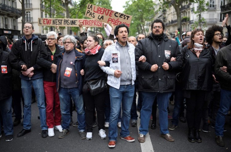People take part in a demonstration called by the collectif 