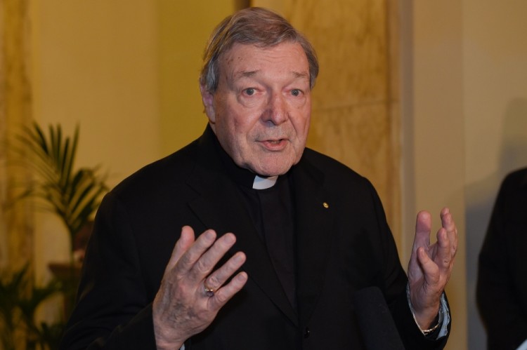 (FILES) This file photo taken on March 03, 2016 shows Vatican finance chief Cardinal George Pell speaking to the media at the Quirinale hotel in Rome on March 3, 2016 at the end of evidence via video-link to Australia's Royal Commission into Institutional Responses to Child Sexual Abuse in Sydney for a second of three days.  Pell was charged on June 29, 2017 with multiple child sex offences in Australia, police said. 