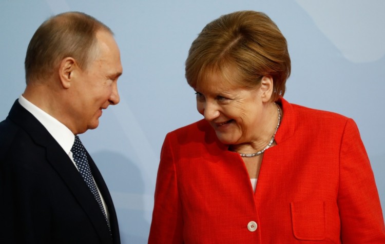 Владимир Путин и Ангела Меркель. Фото AFP PHOTO / Scanpix