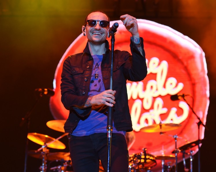 JULY 20th, 2017: Linkin Park lead singer Chester Bennington has died aged 41. The coroner said Bennington apparently hanged himself. His body was found at a private home in the county at 09:00 local time (17:00 GMT) on Thursday. He leaves a wife, and six children from two marriages. STOCK PHOTO: WEST PALM BEACH - MAY 02: Chester Bennington of Stone Temple Pilots performs during Day 4 of Sunfest on May 2, 2015 in West Palm Beach, Florida.  CAP/MPI04 ©MPI04/Capital Pictures