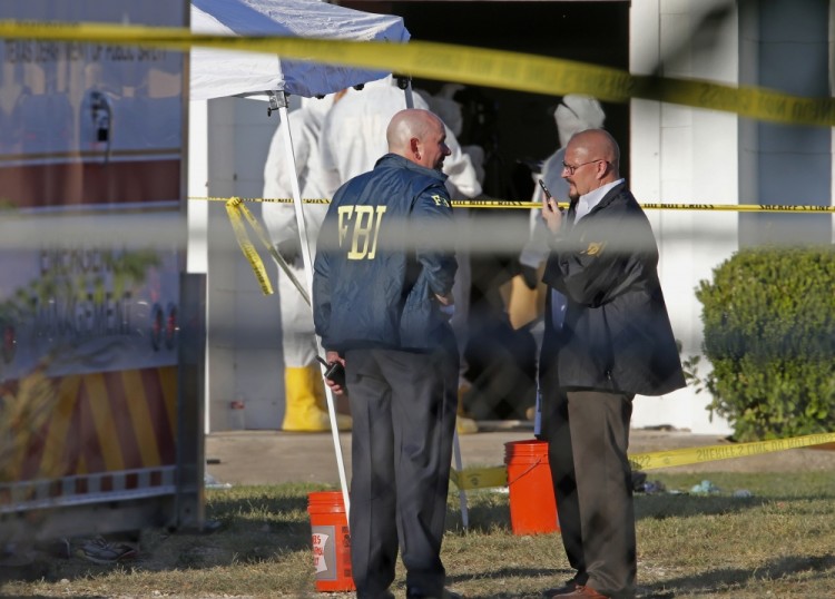 First responders work the scene of a shooting at the First Baptist Church in Sutherland Springs, Texas, Sunday, Nov. 5, 2017. A man opened fire inside of the church on Sunday, killing more than 20 people. (Edward A. Ornelas/The San Antonio Express-News via AP)