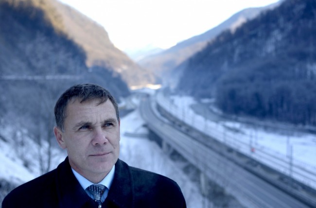 (FILES) A file picture taken on December 28, 2013, shows Environmental Watch ecology group activist Yevgeny Vitishko, standing in front of the new road between Adler and Krasnaya Polyana in the Black Sea resort of Sochi. Yevgeny Vitishko who campaigned against damage caused by Olympic development was sentenced today to three years in a penal colony  after a court rejected his appeal. The previous sentence was from a 2012 conviction for damaging property linked to the Krasnodar regional governor. AFP PHOTO / MIKHAIL MORDASOV