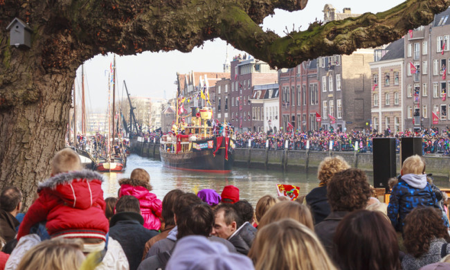 DORDRECHT, THE NETHERLANDS - NOVEMBER 12, 2011: Boat of Saint Nicolas arrives in the harbor of Dordrecht for the parade with Zwarte Piet in the streets of Dordrecht