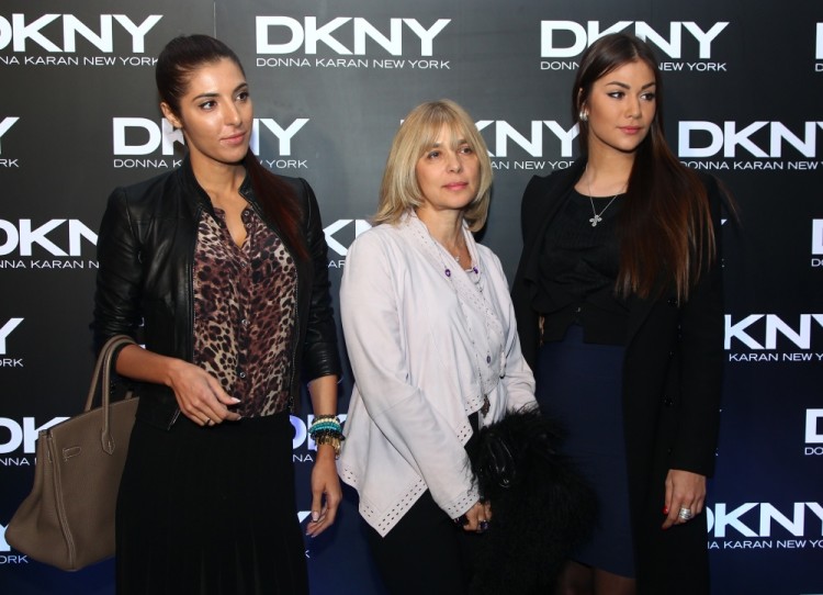 1086039 Russia, Moscow. 04/05/2012 Actress Vera Glagoleva, center, with her daughters Maria, left, and Anastasia, right, at a DKNY style party at the Red October chocolate factory workshop. Ekaterina Chesnokova/RIA Novosti