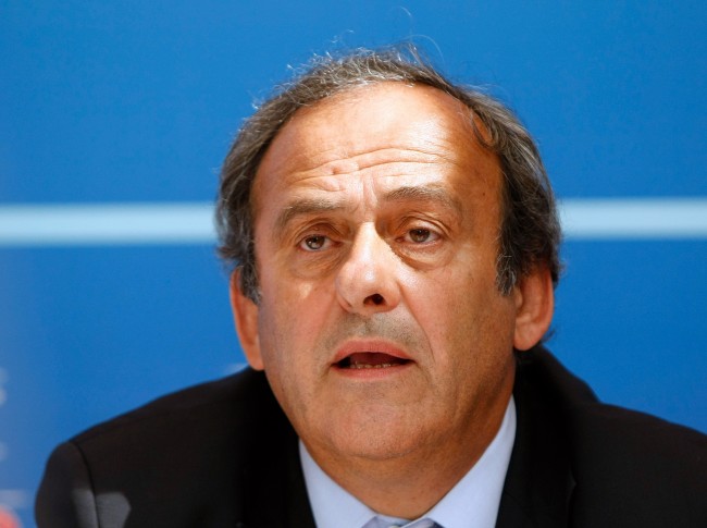 FILE - In this Aug. 28, 2015 file photo UEFA President Michel Platini delivers his speech during  a press conference after the soccer Europa League draw ceremony at the Grimaldi Forum, in Monaco. On Thursday, Oct. 8, 2015 file photo FIFA provisionally banned President Sepp Blatter and UEFA President Michel Platini for 90 days. (AP Photo/Claude Paris)