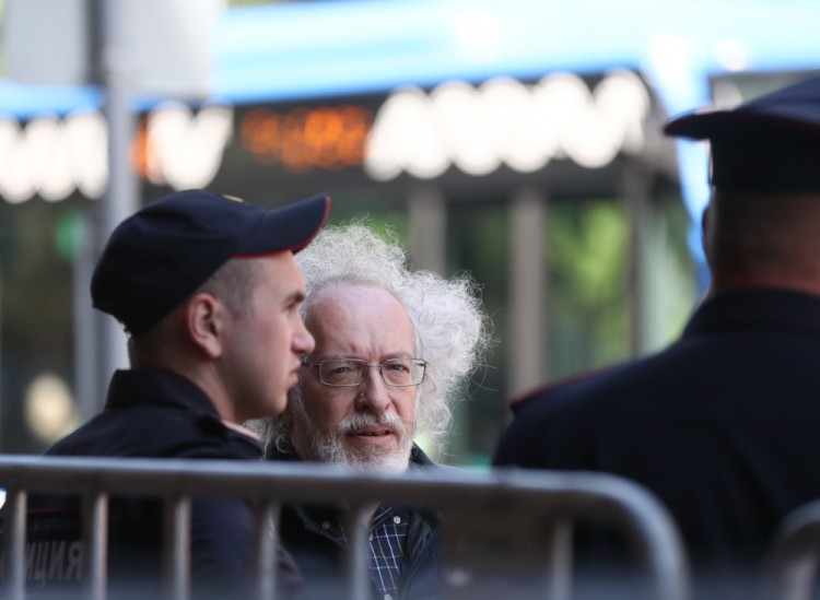 MOSCOW, RUSSIA  JULY 11, 2017: Ekho Moskvy [Echo of Moscow] Radio Station Editor-in-Chief Alexei Venediktov (R) at a mourning ceremony for Russian Internet pioneer, blogger and Internet entrepreneur Anton Nosik at the Central House of Writers in Bolshaya Nikitskaya Street. Stanislav Krasilnikov/TASS