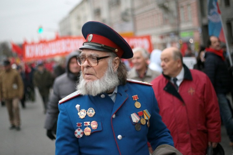 MOSCOW, RUSSIA  NOVEMBER 7, 2017: A man wearing medals and badges as the Russian Communist Party rallies to mark the centenary of the 1917 Bolshevik Revolution. Sergei Bobylev/TASS