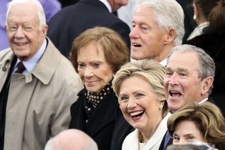 Former President Jimmy Carter (L-R), Rosalynn Carter, Former President Bill Clinton, Hillary Clinton and Former President George W. Bush wait for the 58th Presidential Inauguration to begin at the U.S. Capitol in Washington, Friday, Jan. 20, 2017. (AP Photo/Andrew Harnik)