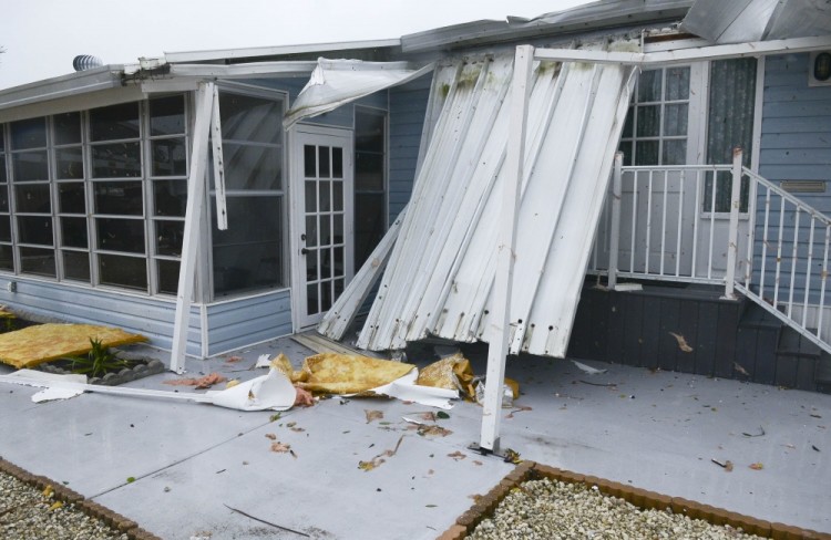 Sep 10, 2017; Palm Bay, FL, USA;  A damaged home in Palm Bay Estates Mobile Home Park. A tornado spawned by Hurricane Irma hit the home.  Mandatory Credit: Craig Bailey/Florida Today via USA TODAY NETWORK