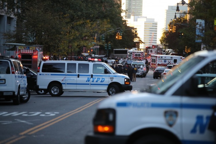 (171031) -- NEW YORK, Oct. 31, 2017 (Xinhua) -- Police vehicles and ambulances are seen near the site of an attack in lower Manhattan in New York, the United States, on Oct. 31, 2017. Eight people were killed and a dozen more injured after a truck plowed into pedestrians near the World Trade Center in New York City, the mayor said on Tuesday. (Xinhua/Wang Ying) (Photo by Xinhua/Sipa USA)