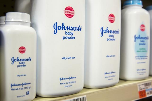 Bottles of Johnson & Johnson baby powder line a drugstore shelf in New York October 15, 2015.  REUTERS/Lucas Jackson